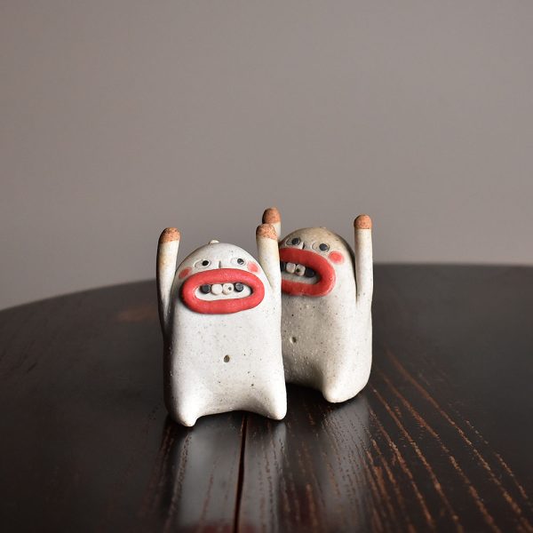 Hand-Pinched Toothy Figurines